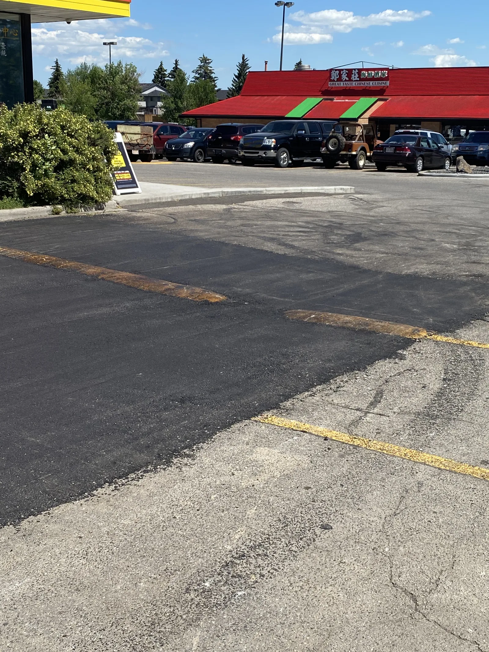Patched commercial parking lot in Calgary